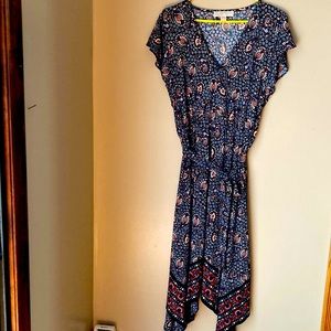 Asymmetrical dress , soft and unique , beautiful cut and flowing look.